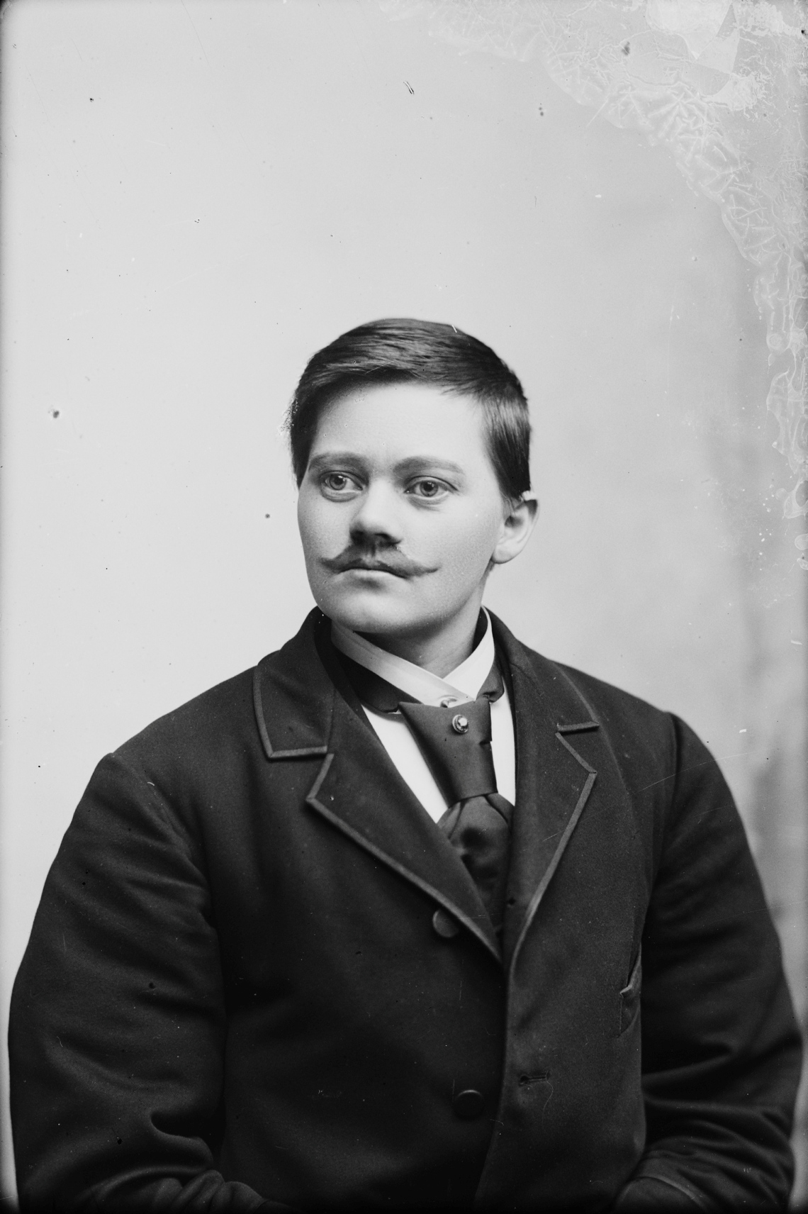 Berg & Høeg, Marie Høeg with a moustache, 1895—1903. Preus Museums collection.